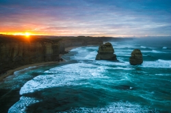 Sunrise at the Twelve Apostoles surrounded by the ocean mist in the Great Ocean Road, Victoria, Australia.